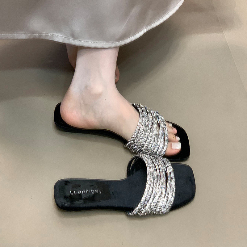 Fashionable one-piece slippers for women in summer, worn by lazy people, with rhinestones and low heels, exposed toes, and a sense of luxury Fashionable one-piece slippers for women in summer, worn by lazy people, with rhinestones and low heels, exposed toes, and a sense of luxury