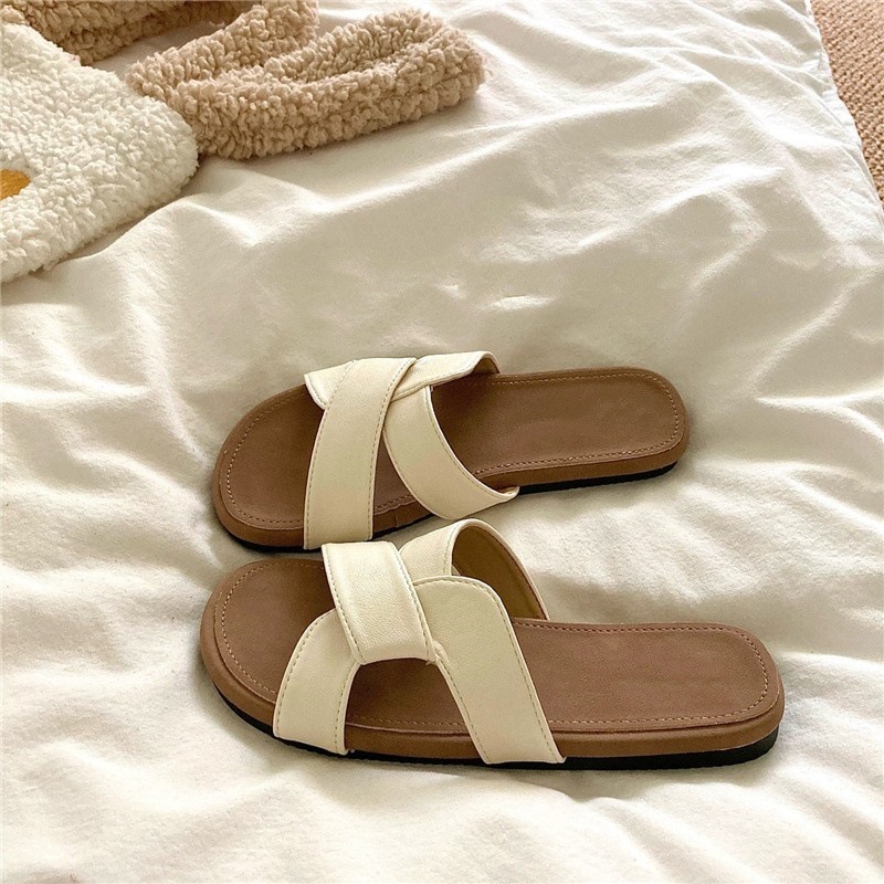 Soft and sticky Q bullet~! Good texture, niche twisted cross slippers, women's soft outer wear, summer ins beach sandals