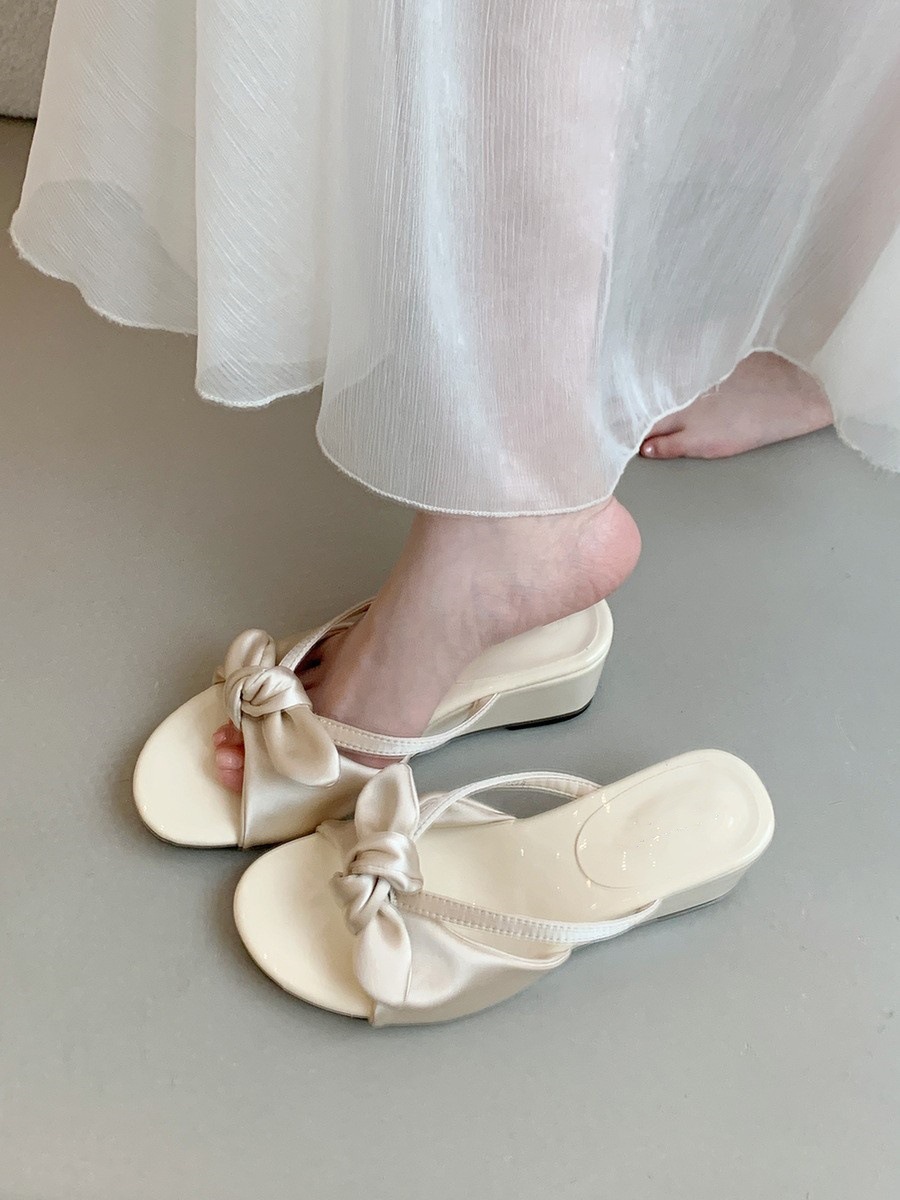 Slope heel leopard print slippers for women's summer outdoor wear, new French style dress with bow tie, cool slippers, vacation fairy style beach shoes Slope heel leopard print slippers for women's summer outdoor wear, new French style dress with bow tie, cool slippers, vacation fairy style beach shoes