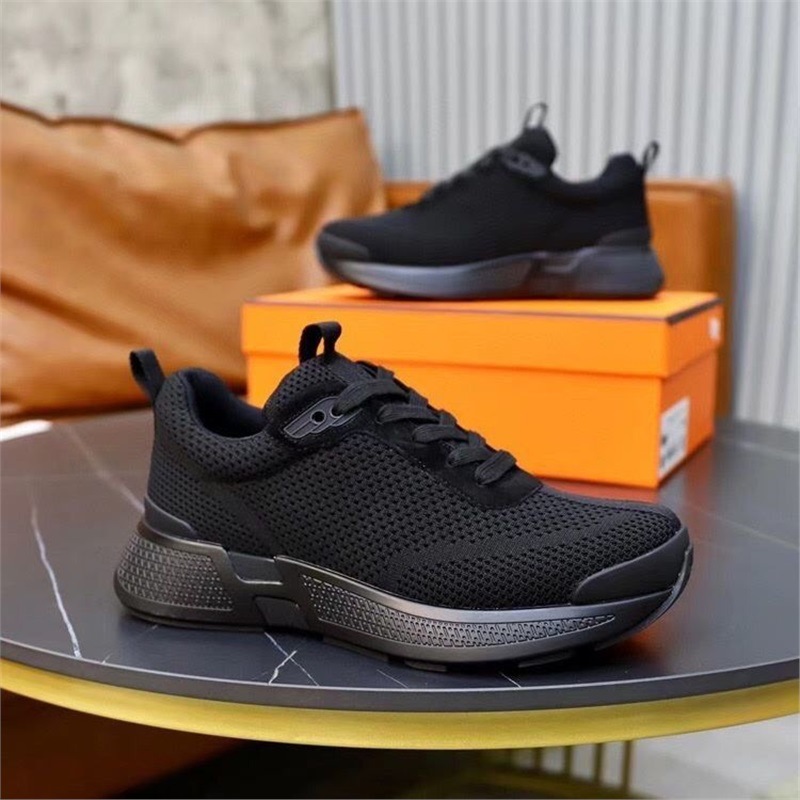 Hong Kong trendy men's shoes luxury thick soled trendy lightweight shock-absorbing fly woven mesh breathable men's sports and leisure shoes