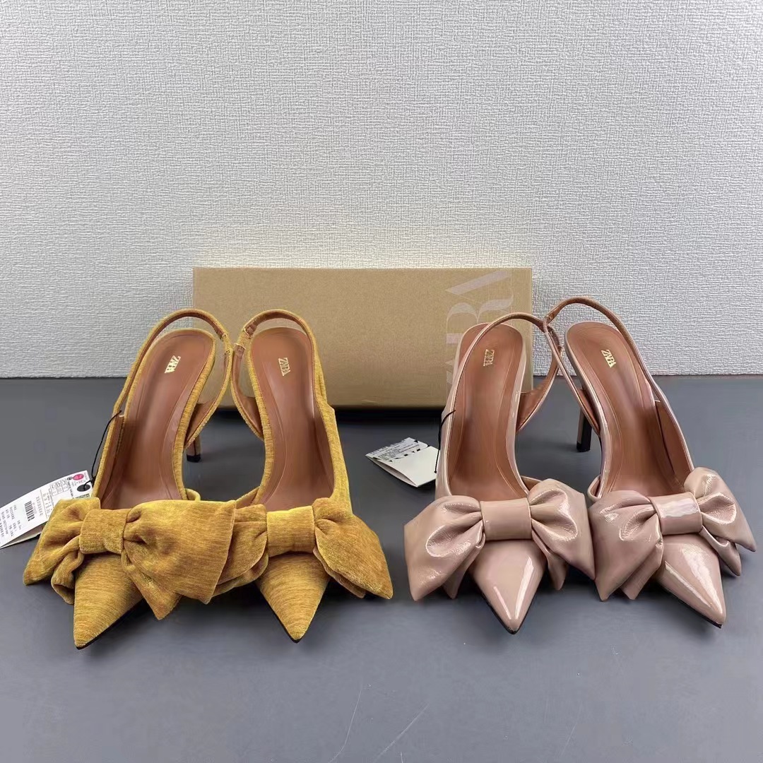 Spain 2024 Summer New Style Lacquered Leather Shallow Mouth Women's Shoes with Bow Decoration Pointed High Heels Muller Sandals