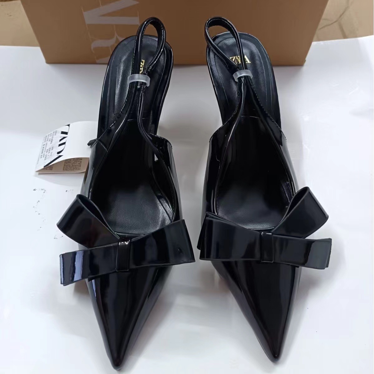 ZA2024 Summer New Butterfly Knot Decoration Rear Tripping Strap Casual Versatile Pointed Stiletto High Heels Sandals for Women