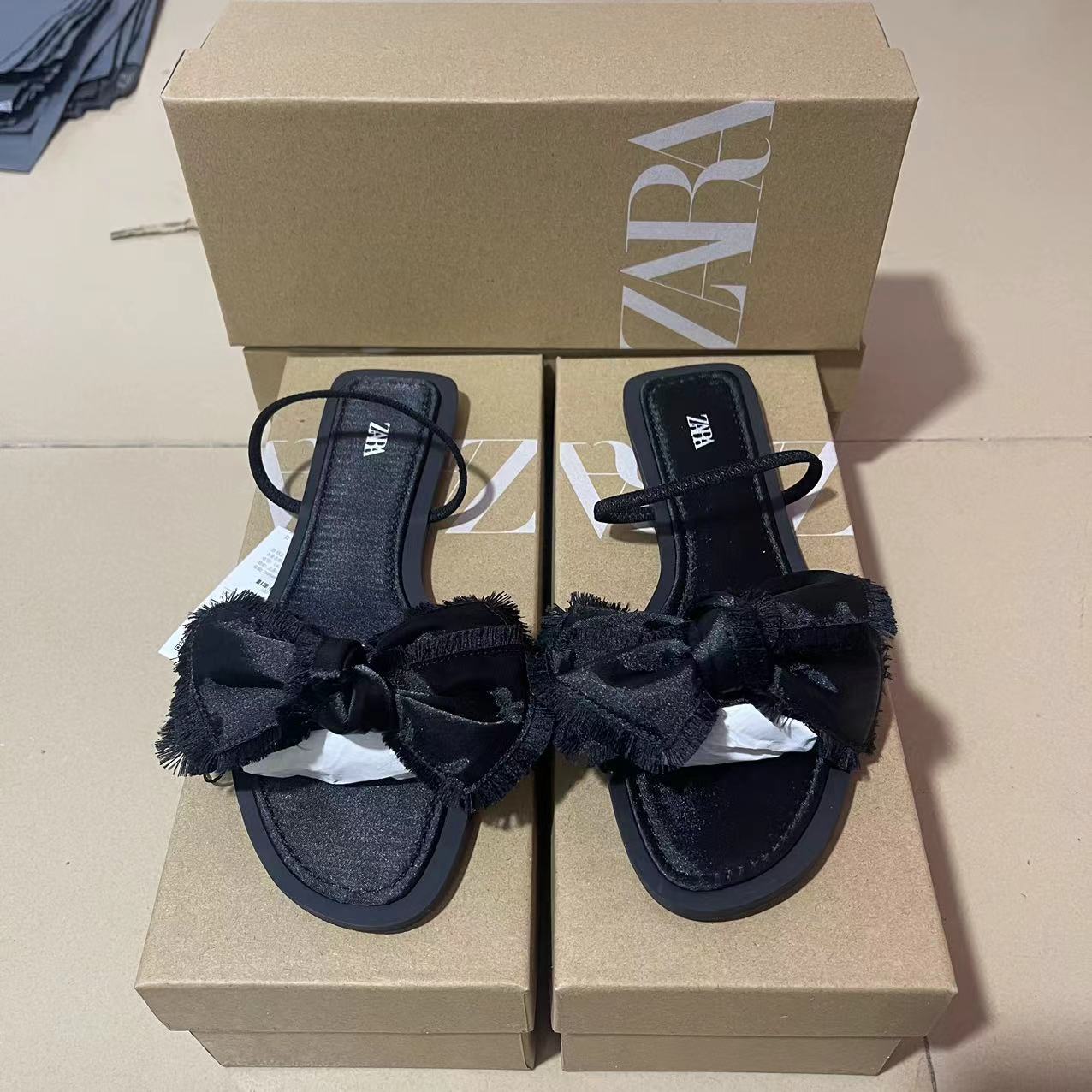 ZA2024 summer new black flat bottom back strap with bow decoration fashionable women's sandals for wearing outside