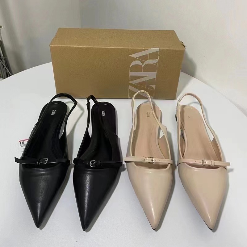 Spanish new foreign trade flat bottomed women's shoes with French pointed straight knot decoration fashion shallow mouth exposed heel flat heel sandals for women
