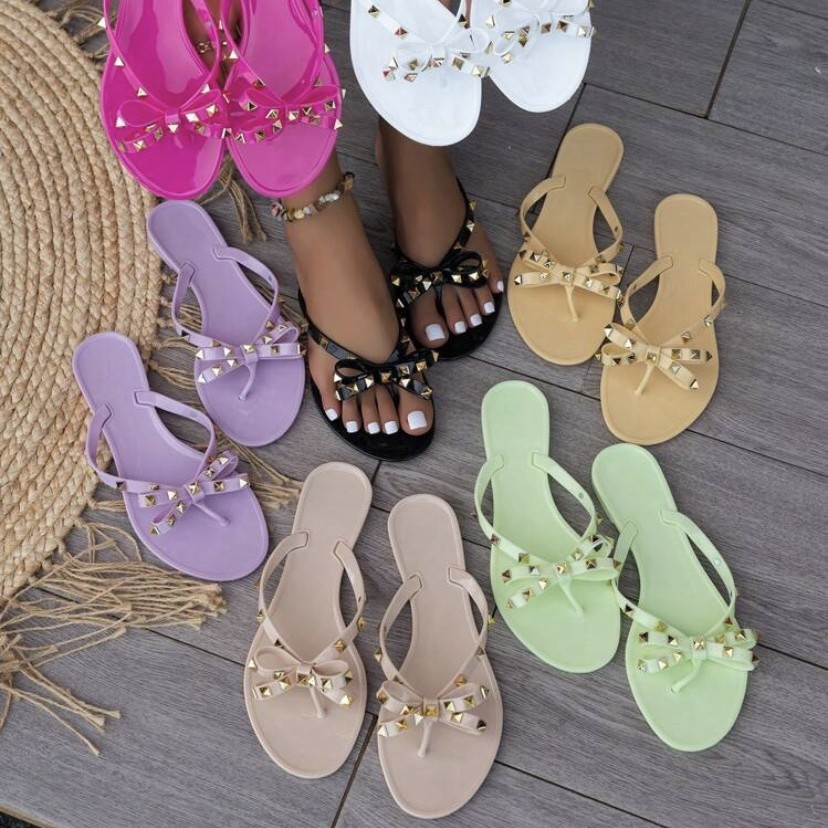 New Foreign Trade Rivet Shoes Butterfly Knot Flip flops Summer Outing Beach Flat Bottom Transparent Jelly Slippers